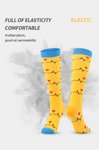 Compression socks for women and nurses, yellow long knee high socks with heart ECG pattern.