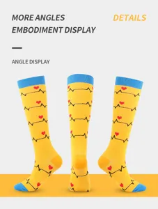 Yellow compression socks with heartbeat and heart pattern, ideal for nurses and sports.