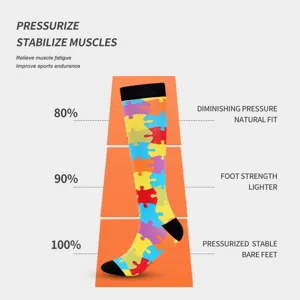 Colorful puzzle pattern compression sports socks for muscle support and daily fitness wear.