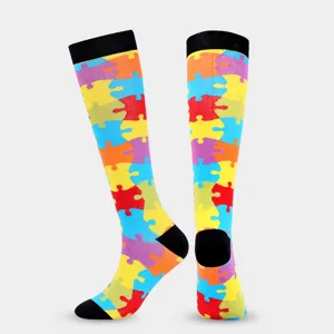 Vibrant jigsaw puzzle pattern compression socks designed for active sports and daily wear.