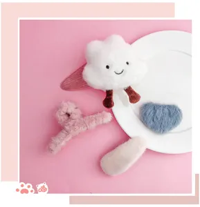 Cute plush hair clip set detail featuring soft cloud claw and heart hairpins for sweet daily styles.