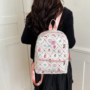 Cute cartoon print backpack detail view, featuring pink straps and large capacity design.
