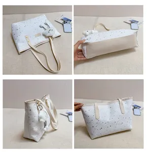 Large capacity tote bag for women, stylish star print shoulder bag with cute cloud pendant.