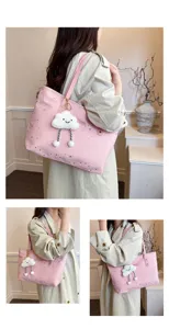 Japanese pink tote bag featuring allover star print and cute fluffy cloud pendant.