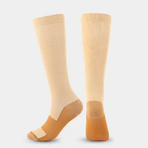 Beige and brown sports compression socks, featuring ribbed calf design and reinforced heel.