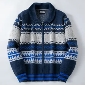 Detailed macro view of retro ethnic jacquard knit pattern on men's navy zip-up cardigan.