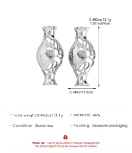 Detail view of silver alloy vase brooches with dimensions and weight specs.