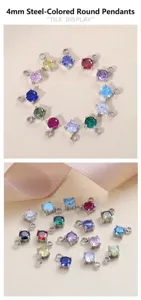 Close-up view of 4mm round birthstone zircon pendants with steel claw settings