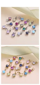 Macro detail of 4mm round birthstone CZ pendants in gold and silver titanium settings