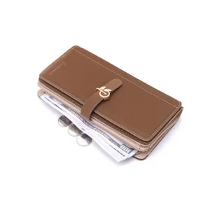 Close-up detail of women's brown PU leather long wallet with cash and coins storage