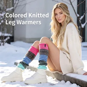 Close-up of colorful striped knitted leg warmers with button detail on snowy background.