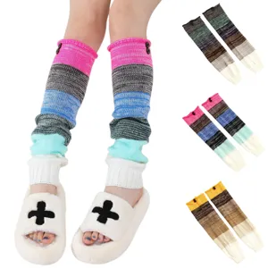 Detail view of colorful striped knitted over-the-knee leg warmers with button decor