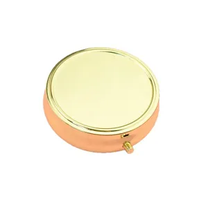 Boîte à pilules ronde de 6cm en métal avec couvercle miroir doré et base en cuivre