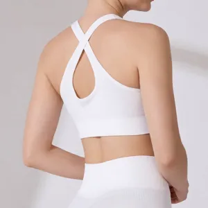 Back view of a white high-impact sports bra featuring a cross-strap cutout design