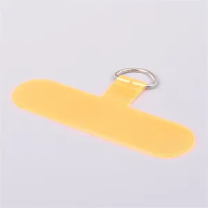 Universal bright yellow T-shaped PVC phone lanyard tether tab with durable silver metal D-ring