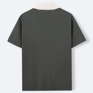 Detailed back view of a slim fit men's knit polo shirt with white contrast collar