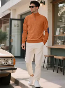 Men's stylish orange textured quarter-button sweater featuring contrast elbow patches
