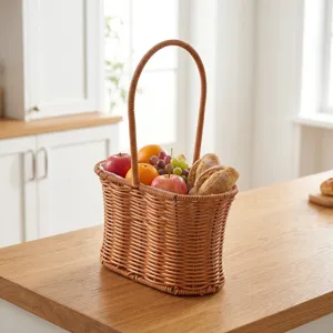 Detailed view of a woven wicker-style handle basket filled with fresh fruit and bread.