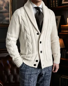 Detailed shot of men's cream cable-knit cardigan with shawl collar and buttons