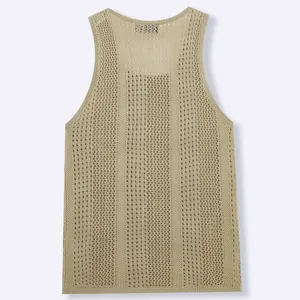 Macro view of the breathable hollow knitted mesh texture of the men's U-neck tank top.
