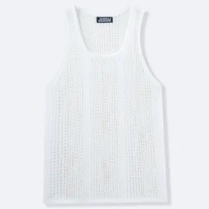 Macro view of white hollow-out knitted tank top with a deep U-neck and soft texture