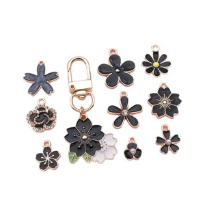 Elegant black enamel flower charms set including cherry blossom and daisy for DIY jewelry