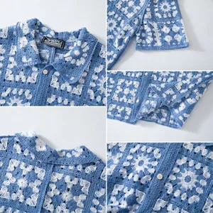 Close-up detail of blue and white floral crochet hollow knit fabric on a Polo shirt