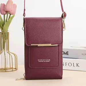 Burgundy faux leather vertical crossbody phone bag with adjustable strap and zipper
