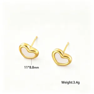 Close-up of gold heart stud earrings with shell inlay showing dimensions and weight.