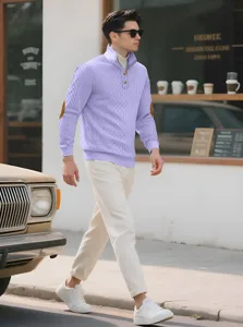 Detailed view of lavender jacquard knit sweater with stand collar and elbow patches