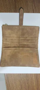 Interior view showing multiple card slots and ID window of brown frosted long wallet