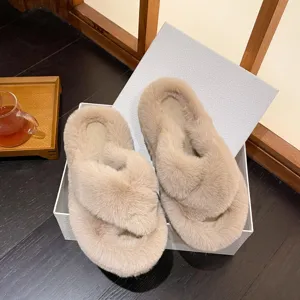 Cozy beige cross-strap fuzzy slippers presented in a textured white premium gift box.