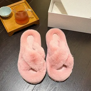 Elegant soft pink plush cross strap slippers for cozy home and outdoor winter comfort wear