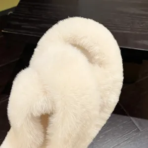 Close-up of the plush faux fur texture on these cozy cross-strap home slippers.
