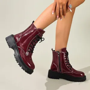 Bottines Martin bordeaux brillantes à semelles compensées avec fermeture éclair et lacets