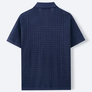 Back view of navy blue knit Polo shirt showing intricate vertical textured pattern.