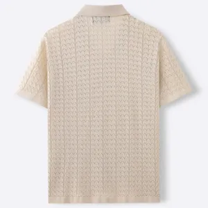 Detailed back view of men's beige knitted polo shirt with intricate jacquard pattern