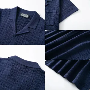 Detailed macro view of men's navy blue jacquard knit polo shirt with Cuban collar.
