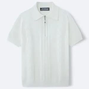 Close-up detail of white men's knit polo shirt featuring a half-zip and diamond texture