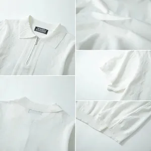 Close-up detail of men's white knitted Polo shirt with geometric patterns and half-zip collar.