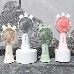 Set of portable mini handheld fans in soft macaron colors with cute crown design