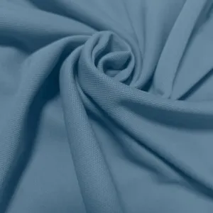 Macrodetail van de ademende blauwe piqué gebreide stof voor heren t-shirts met lange mouwen