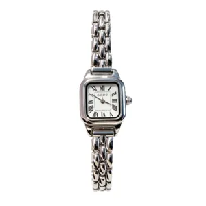 Vintage Guou silver quartz watch for women featuring a small square dial and link bracelet
