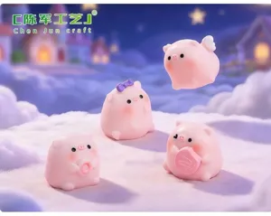 Four cute pink pig miniature figurines with wings and donuts in a dreamy cloud scene