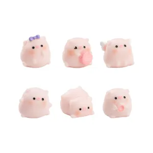 Collection of six cute pink pig figurines for DIY dollhouse and desktop decoration set