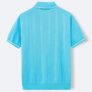 Back view of light blue knitted short sleeve polo shirt with white trim accents