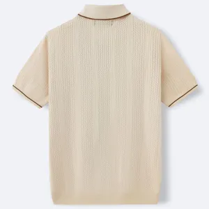 Back view of a men's beige short sleeve knit polo shirt with brown piping details