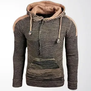 Detail view of men's color-block knitted hoodie with half-zip and kangaroo pocket