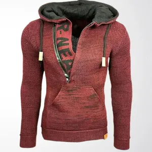 Men's wine red knitted hoodie featuring a black half-zip detail and kangaroo pocket.