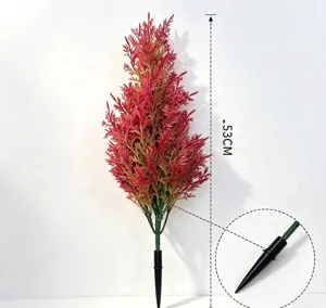Detail view showing 53cm artificial red pine leaves with a pointed base attachment